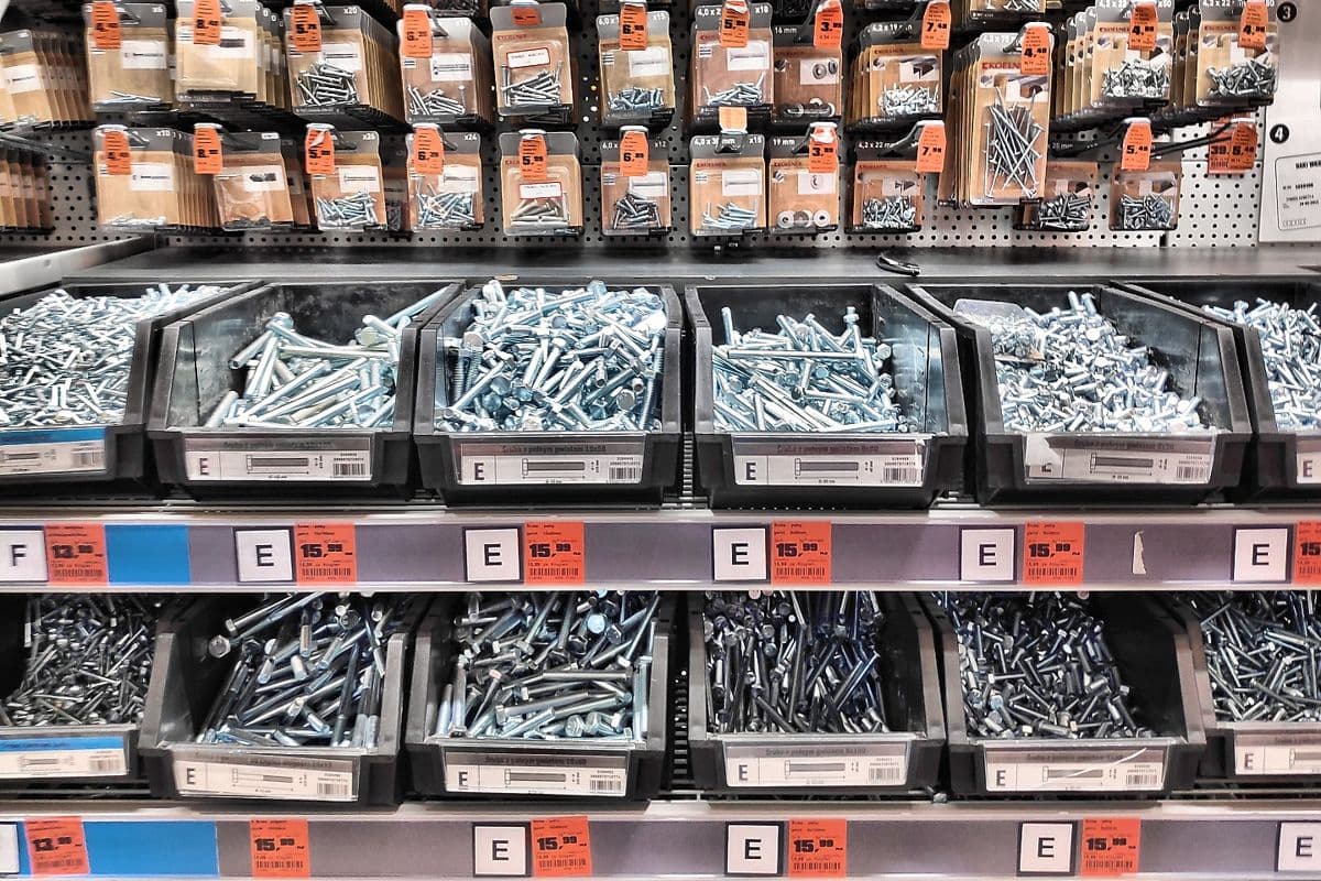 Bins of screws and bolts in a hardware store.