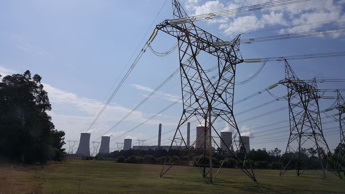 High-voltage power lines running from a power station.