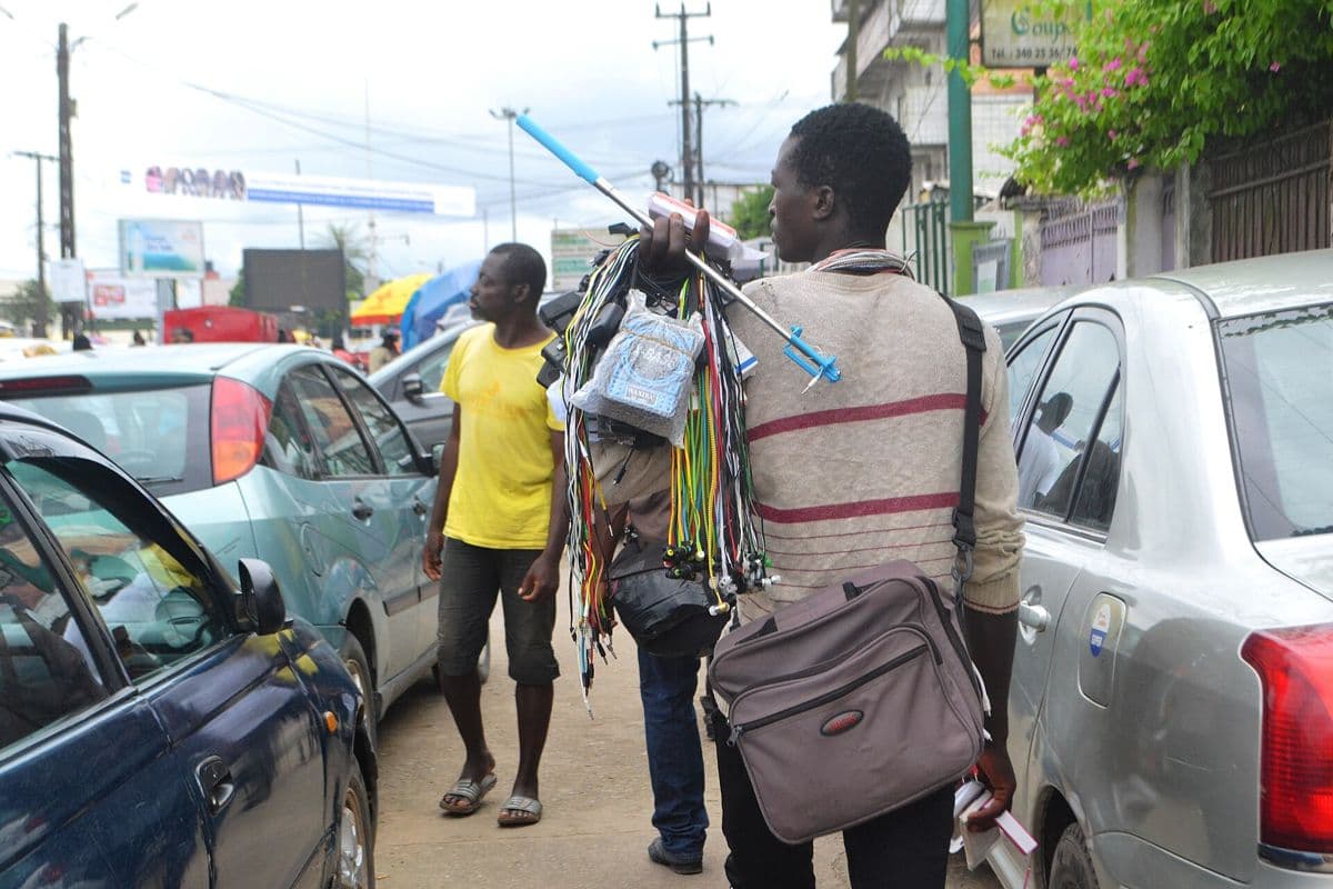 People on a busy street in an African town.
